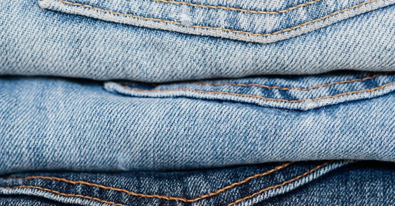 Clothes Storage - Stack of blue jeans arranged by color