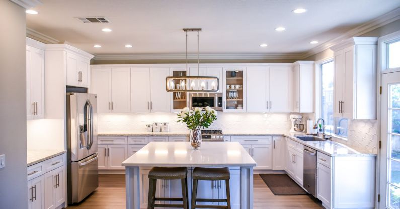 Modern Kitchen - White Wooden Cupboards