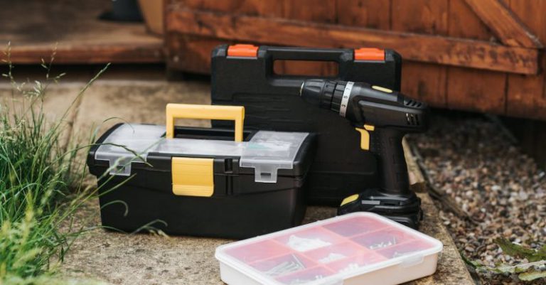 Organized Garage - Toolboxes placed near wooden door