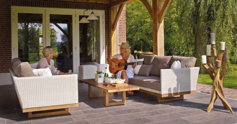 Deck Vs Patio - Two Women Sitting on Sofa