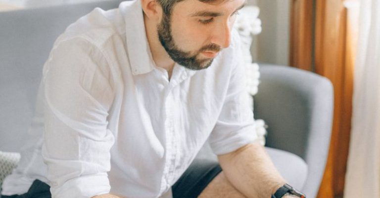 Home Office - A Man Using a Laptop