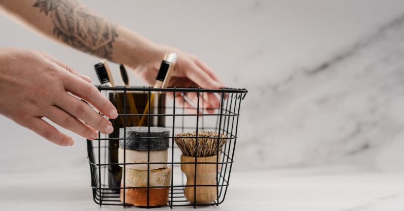 Tools Shopping - Person Holding Stainless Steel Basket With Brown and Black Metal Tools