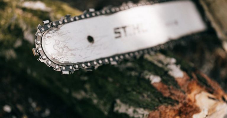 Chainsaw Selection - Selective Focus Photo of Chainsaw